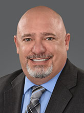 Dr. Michael L. Tholen